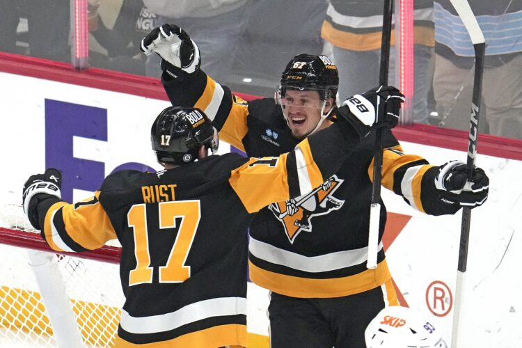 Crosby makes history in win